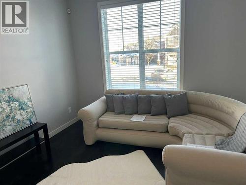 1101, 881 Sage Valley Boulevard Nw, Calgary, AB - Indoor Photo Showing Living Room