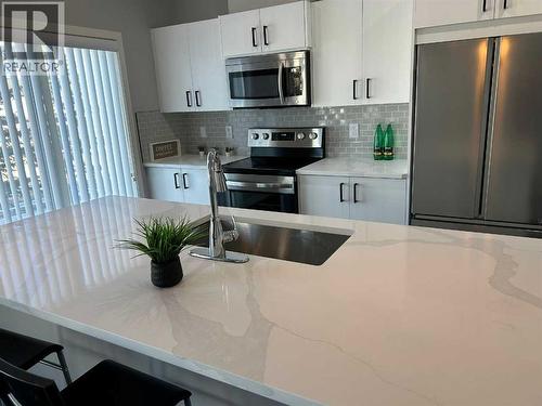 1101, 881 Sage Valley Boulevard Nw, Calgary, AB - Indoor Photo Showing Kitchen With Upgraded Kitchen