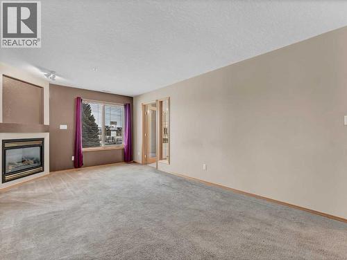 208, 1182 Southview Drive Se, Medicine Hat, AB - Indoor With Fireplace