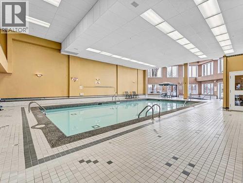 208, 1182 Southview Drive Se, Medicine Hat, AB - Indoor Photo Showing Other Room With In Ground Pool