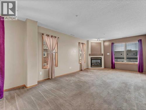 208, 1182 Southview Drive Se, Medicine Hat, AB - Indoor With Fireplace
