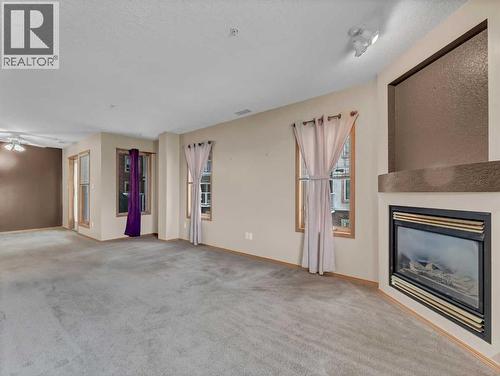 208, 1182 Southview Drive Se, Medicine Hat, AB - Indoor With Fireplace