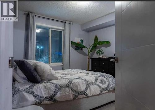 Primary bedroom - 206, 2000 Citadel Meadow Point Nw, Calgary, AB - Indoor Photo Showing Bedroom