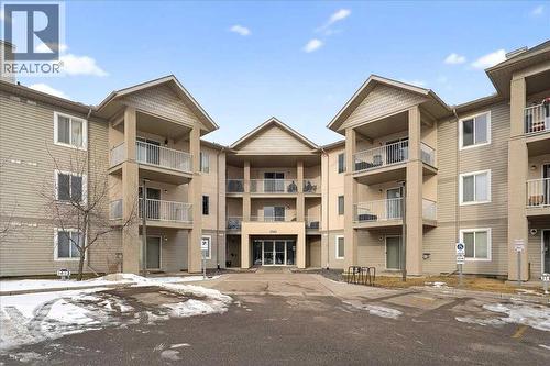 206, 2000 Citadel Meadow Point Nw, Calgary, AB - Outdoor With Balcony With Facade
