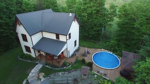 Façade - 57 Mtée De L'Église, Mille-Isles, QC - Outdoor With Above Ground Pool