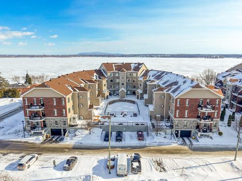 Face arrière - 305-530 Rue Martel, Chambly, QC - Outdoor With Body Of Water With View