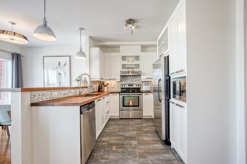 Cuisine - 305-530 Rue Martel, Chambly, QC - Indoor Photo Showing Kitchen With Upgraded Kitchen