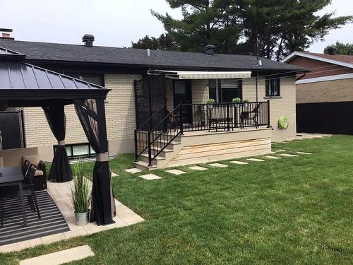Cour - 296 Rue Élie, Laval (Fabreville), QC - Outdoor With Deck Patio Veranda