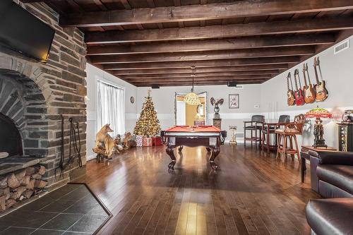 Family room - 221 Rue De La Mission, Lévis (Les Chutes-De-La-Chaudière-Ouest), QC - Indoor With Fireplace