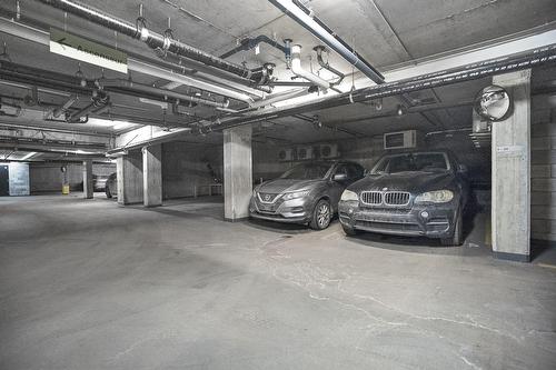 Garage - 702-9185 Rue Lennon, Brossard, QC - Indoor Photo Showing Garage