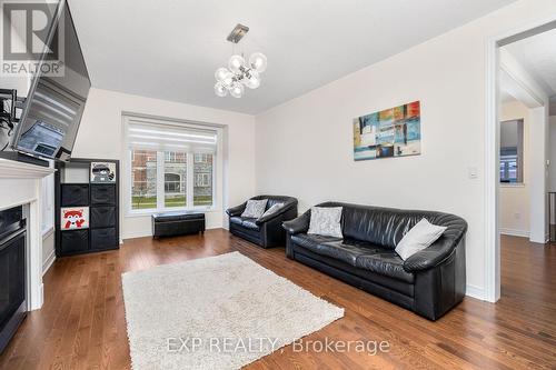 2300 Lozenby Street, Innisfil, ON - Indoor Photo Showing Living Room With Fireplace