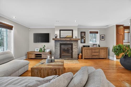 Living room - 147 Rue Gaudreau, Saint-Jérôme, QC - Indoor Photo Showing Living Room With Fireplace