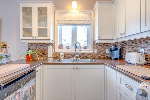 Cuisine - 401-2460 Boul. Lafontaine, Saint-Jérôme, QC - Indoor Photo Showing Kitchen With Double Sink