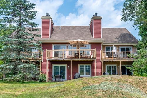 Face arrière - 1808 Ch. Du Golf, Mont-Tremblant, QC - Outdoor With Balcony With Deck Patio Veranda