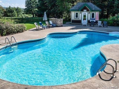 Piscine - 1808 Ch. Du Golf, Mont-Tremblant, QC - Outdoor With In Ground Pool With Backyard