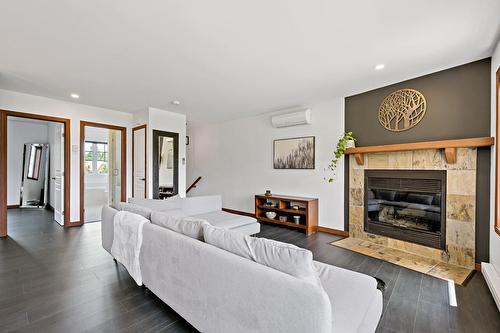 Salon - 1808 Ch. Du Golf, Mont-Tremblant, QC - Indoor Photo Showing Living Room With Fireplace