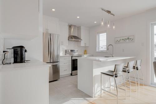 Cuisine - 25 Rue Robert-Laplante, Sainte-Catherine-De-La-Jacques-Cartier, QC - Indoor Photo Showing Kitchen With Upgraded Kitchen