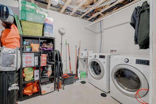 Salle de lavage - 25 Rue Robert-Laplante, Sainte-Catherine-De-La-Jacques-Cartier, QC - Indoor Photo Showing Laundry Room