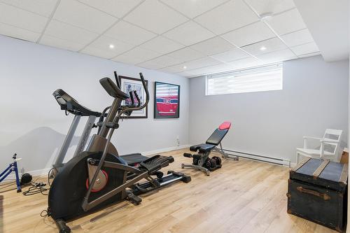 Salle familiale - 717 Rue De Chenonceau, Saint-Jérôme, QC - Indoor Photo Showing Gym Room