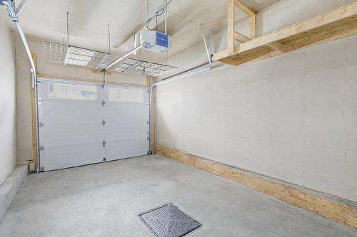 Garage - 717 Rue De Chenonceau, Saint-Jérôme, QC - Indoor Photo Showing Garage