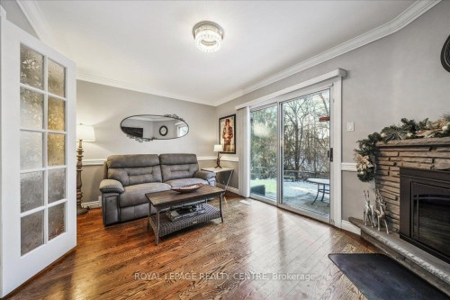 21 Pylon Place, Toronto, ON - Indoor Photo Showing Living Room With Fireplace