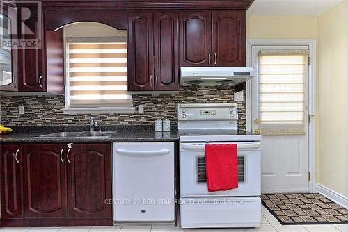 65 Newstead Crescent, Brampton, ON - Indoor Photo Showing Kitchen With Double Sink