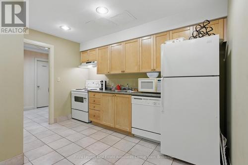 709 - 1140 Parkwest Place, Mississauga, ON - Indoor Photo Showing Kitchen With Double Sink