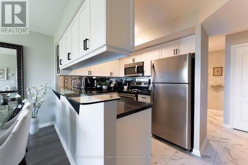 709 - 1140 Parkwest Place, Mississauga, ON - Indoor Photo Showing Kitchen With Stainless Steel Kitchen