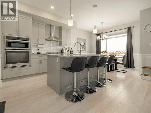 102 Blackwolf Bay N, Lethbridge, AB - Indoor Photo Showing Kitchen With Upgraded Kitchen