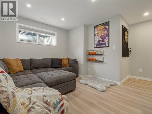 102 Blackwolf Bay N, Lethbridge, AB - Indoor Photo Showing Living Room