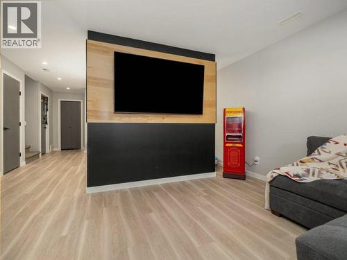 102 Blackwolf Bay N, Lethbridge, AB - Indoor With Fireplace