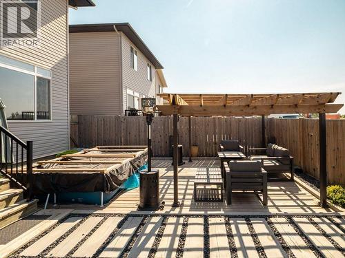 102 Blackwolf Bay N, Lethbridge, AB - Outdoor With Deck Patio Veranda With Exterior