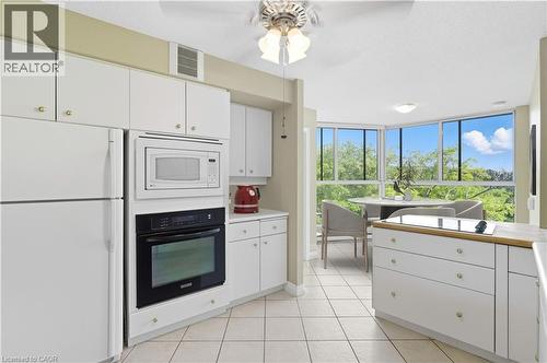 Virtually Staged - 20 Berkley Road Unit# 702, Cambridge, ON - Indoor Photo Showing Kitchen