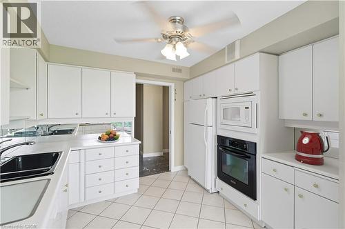 Virtually Staged - 20 Berkley Road Unit# 702, Cambridge, ON - Indoor Photo Showing Kitchen