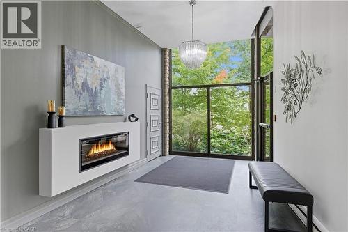 20 Berkley Road Unit# 702, Cambridge, ON - Indoor With Fireplace