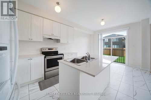 2085 Coppermine Street, Oshawa, ON - Indoor Photo Showing Kitchen With Double Sink