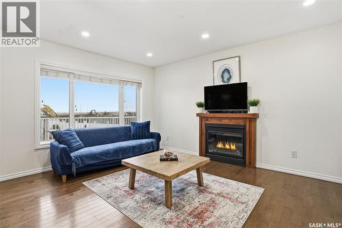 4757 Padwick Avenue, Regina, SK - Indoor Photo Showing Living Room With Fireplace