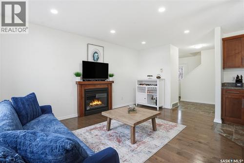 4757 Padwick Avenue, Regina, SK - Indoor Photo Showing Living Room With Fireplace