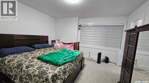 148 Rosewood Boulevard E, Saskatoon, SK - Indoor Photo Showing Bedroom