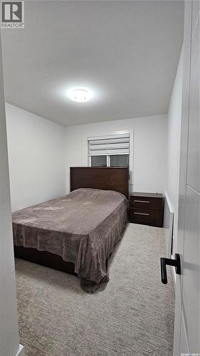 148 Rosewood Boulevard E, Saskatoon, SK - Indoor Photo Showing Bedroom
