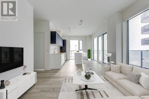 ** Virtually Staged ** - 1012 - 8 Tippett Road, Toronto, ON - Indoor Photo Showing Living Room