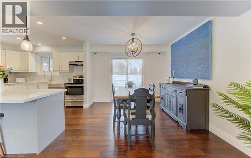 Dining room has sliders to the back deck - 51 Nathaniel Crescent, Kitchener, ON - Indoor Photo Showing Other Room