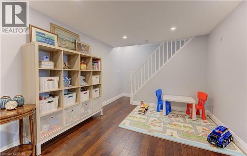 Basement rec room has space for lounging and playing - 51 Nathaniel Crescent, Kitchener, ON - Indoor