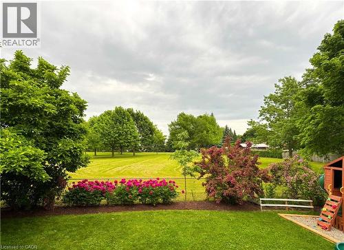 Perennial gardens are beautiful when the snow is gone - 51 Nathaniel Crescent, Kitchener, ON - Outdoor