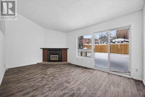 633 Tenth Street, Collingwood, ON - Indoor Photo Showing Other Room With Fireplace