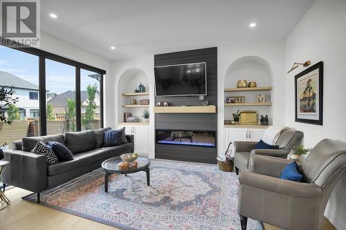 1894 Fountain Grass Drive, London South (South B), ON - Indoor Photo Showing Living Room With Fireplace