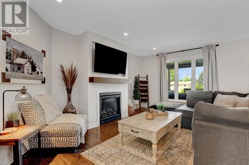 201 Versaille Street, Alfred And Plantagenet, ON - Indoor Photo Showing Living Room With Fireplace