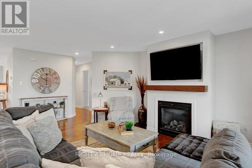 201 Versaille Street, Alfred And Plantagenet, ON - Indoor Photo Showing Living Room With Fireplace