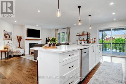 201 Versaille Street, Alfred And Plantagenet, ON - Indoor Photo Showing Kitchen With Fireplace