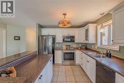 Kitchen with stainless steel appliances - 